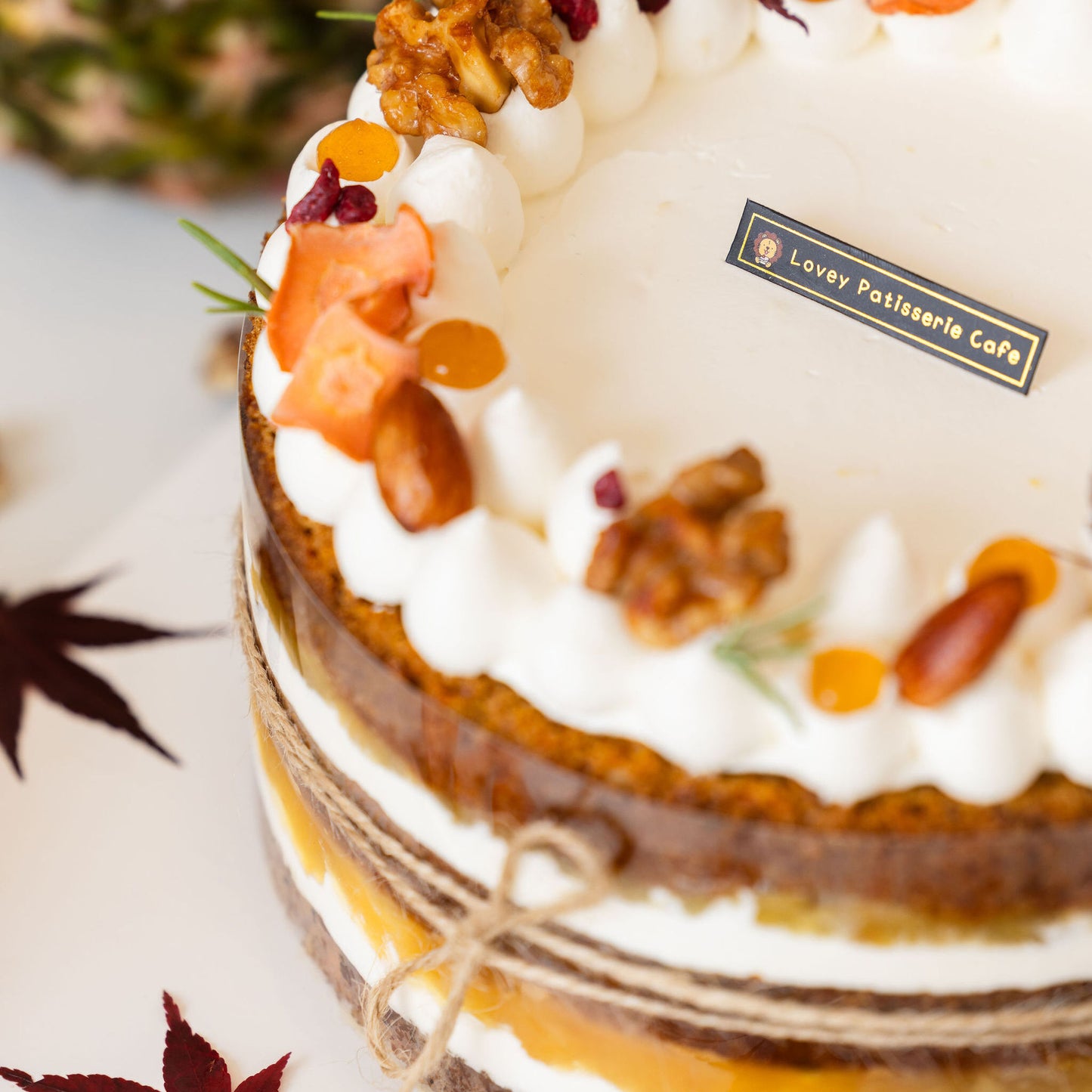 Close-up of vegan carrot shortcake chiffon sponge and plant-based cream texture.