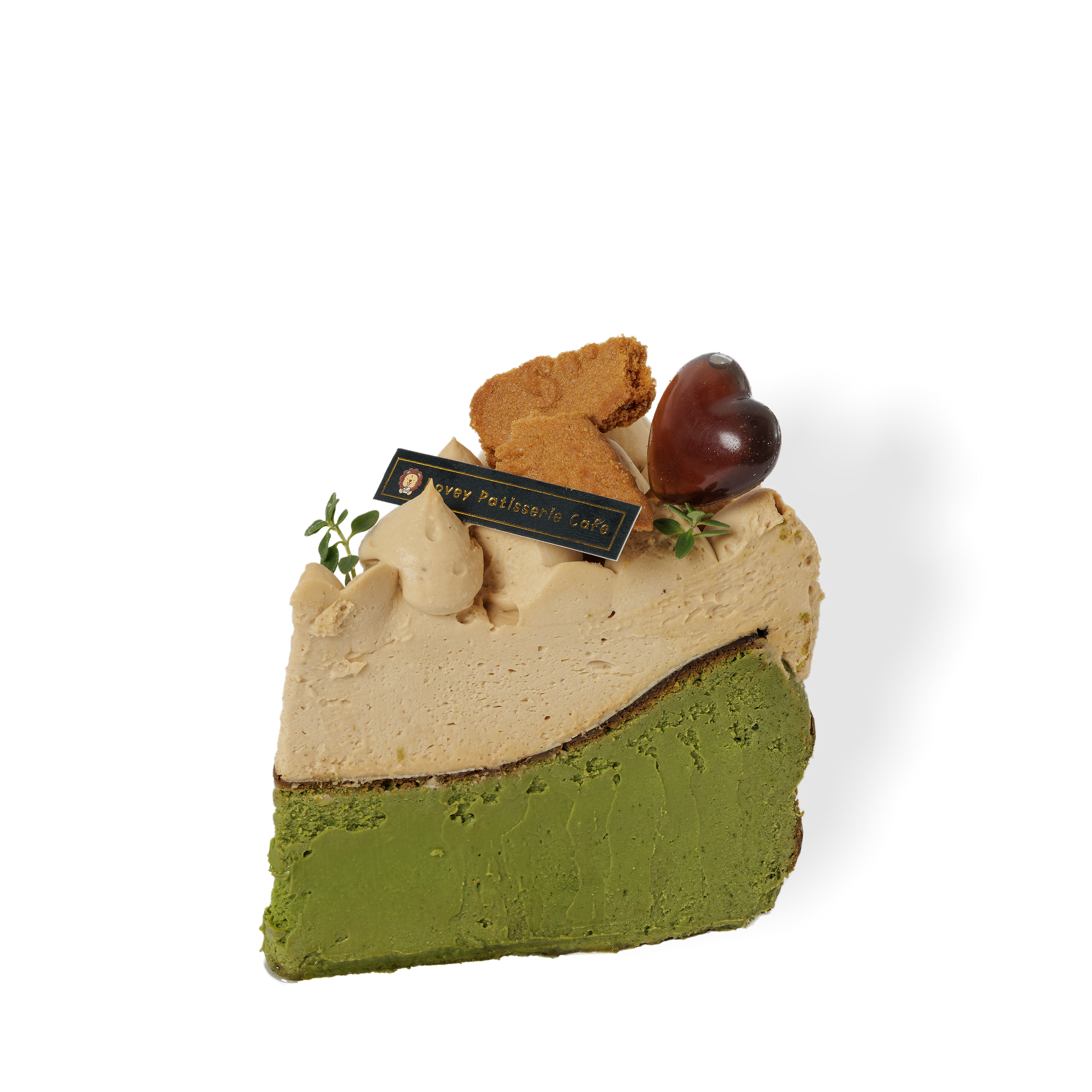 Slice view of gluten-free Earl Grey and Matcha Basque Cheesecake revealing smooth cheesecake layers and vibrant green matcha accents.