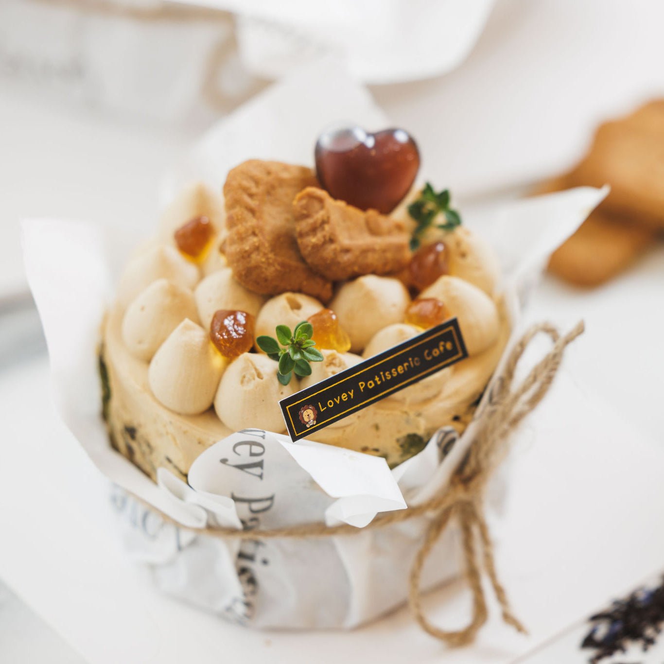 Top detail of Earl Grey and Matcha Basque Cheesecake showing caramelised surface and delicate finishing touches.