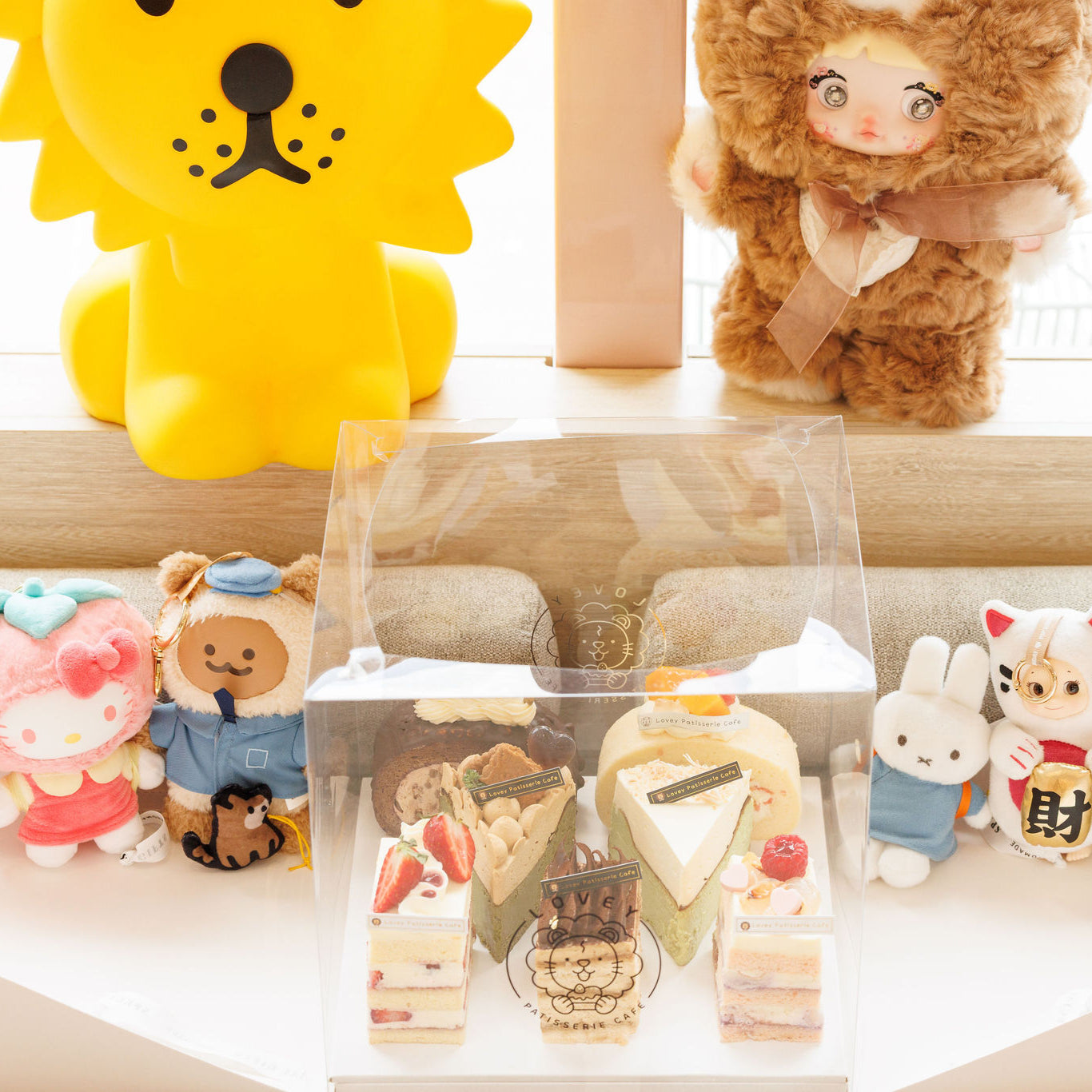 Close-up of Lovey’s Slice Family Box contents showing assorted shortcake and cheesecake slices.